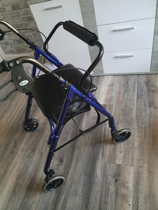  — seat on wheels walker