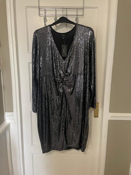  — Dress