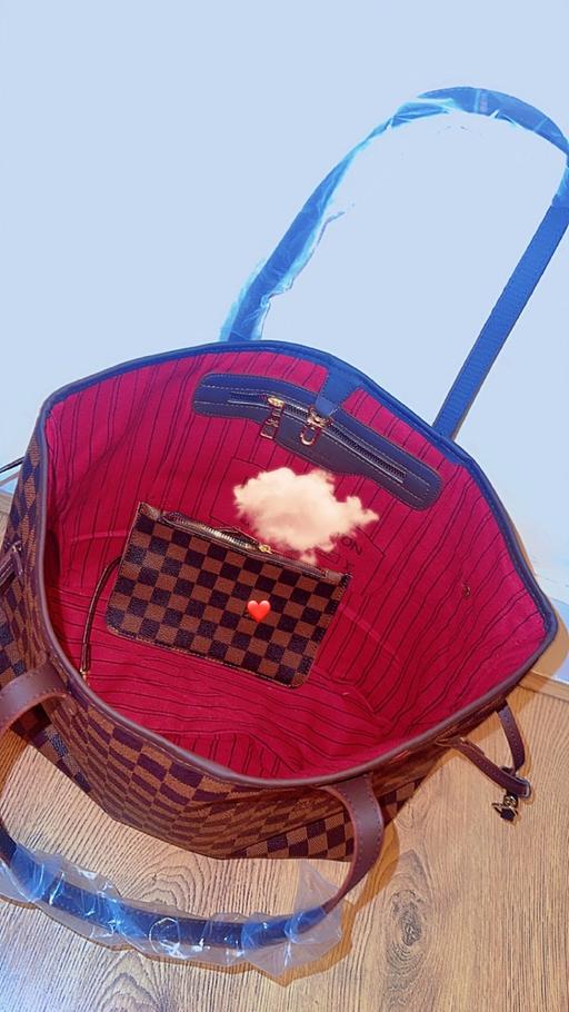  — Handbag