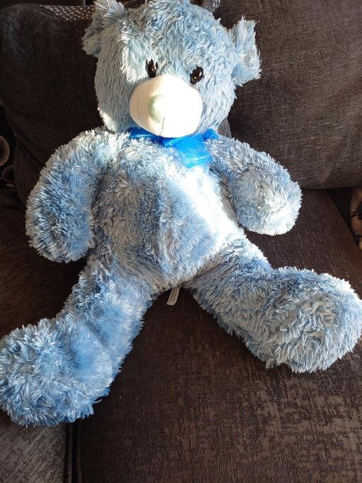  — Large blue teddy bear