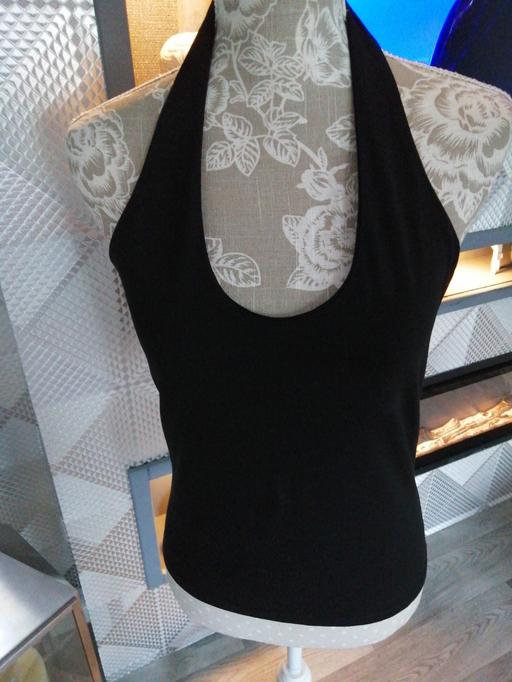  — ladies size *M*