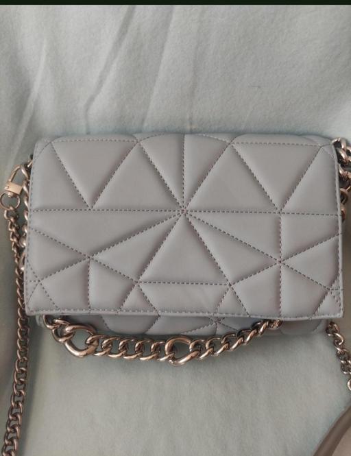  — New purse
