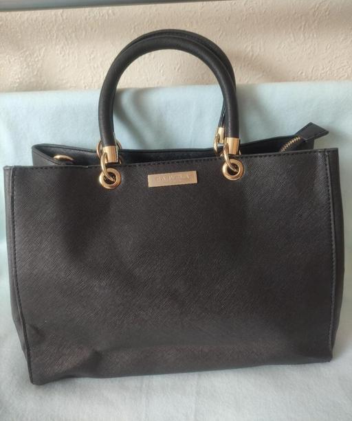  — Carvela bag