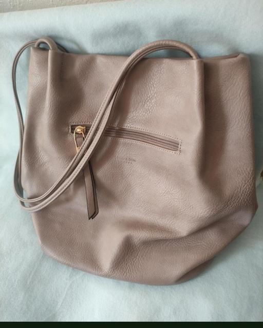  — New hand bag