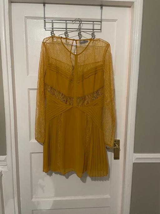  — ASOS DRESS