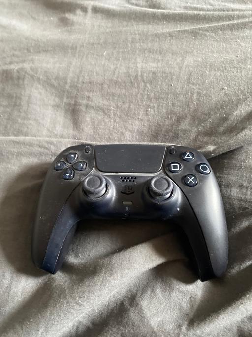  — PS5 black DualShock controller