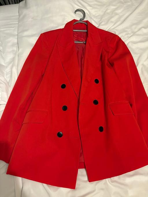  — Red blazer
