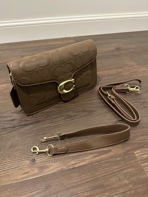  — Coach handbag