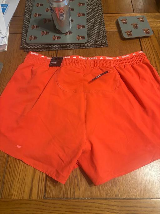  — Running shorts