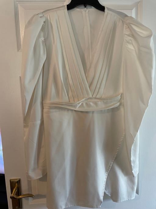  — Dress