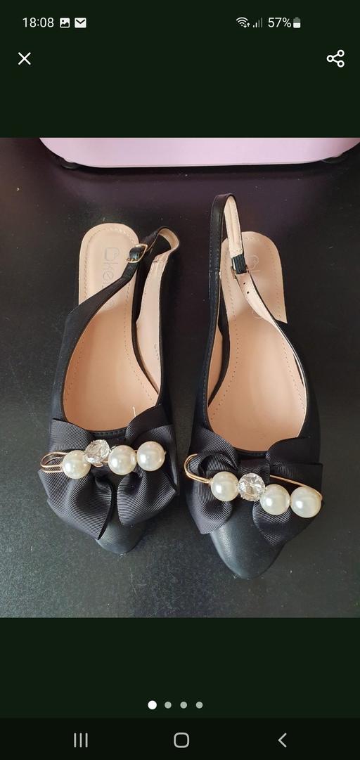  — ladies black flat shoes