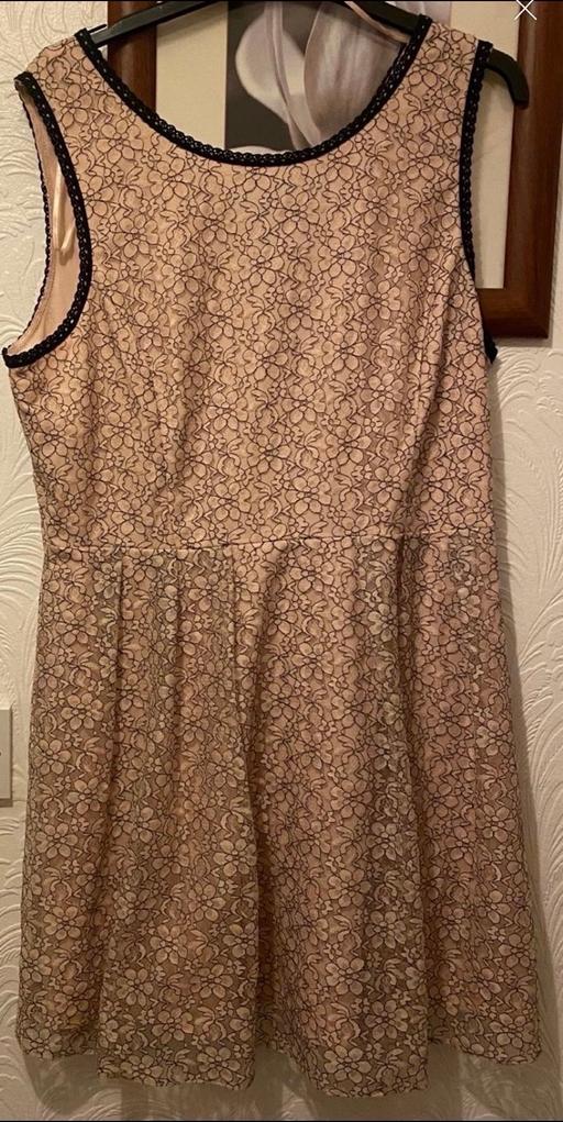  — Ladies dress size 16