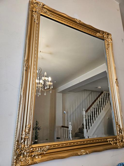  — large gold mirror to collect