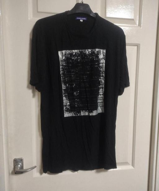  — Black shirt