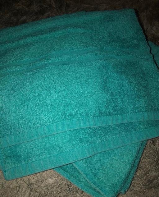  — 2 new towels