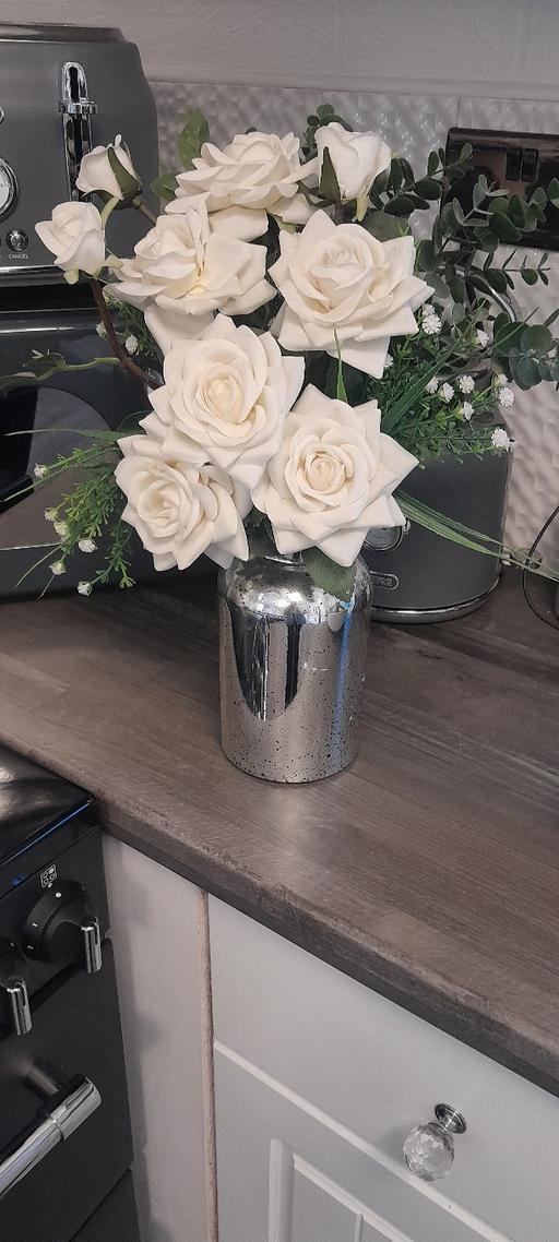  — flower arrangement in silver vace