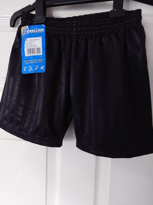  — Boys black sport shorts size 22/24"