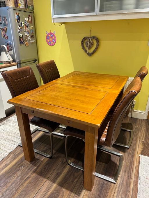  — oak extendable dining table