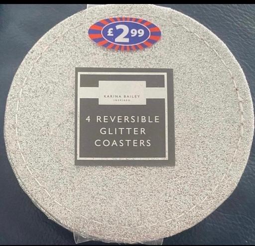  — Silver  drinks coasters