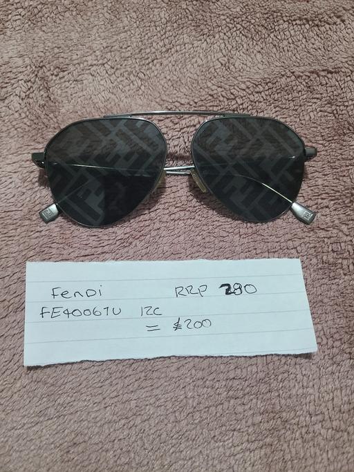  — sunglasses