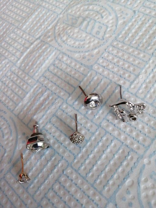  — single earings