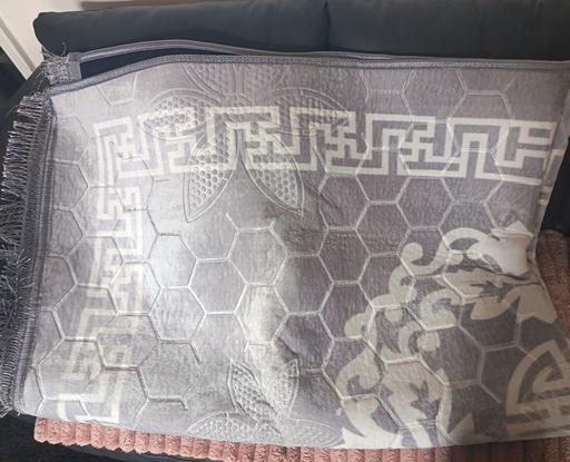  — rug xl