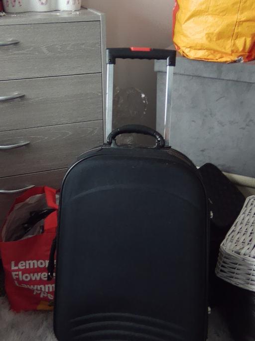  — suitcase