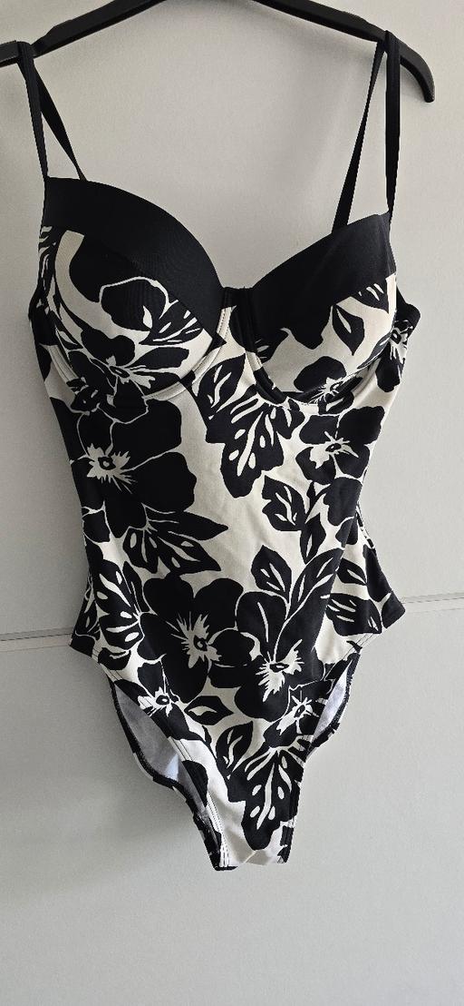  — swimming costume