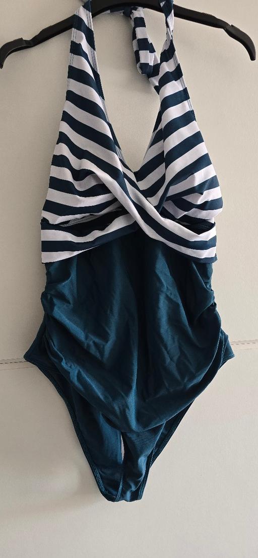  — swimming costume