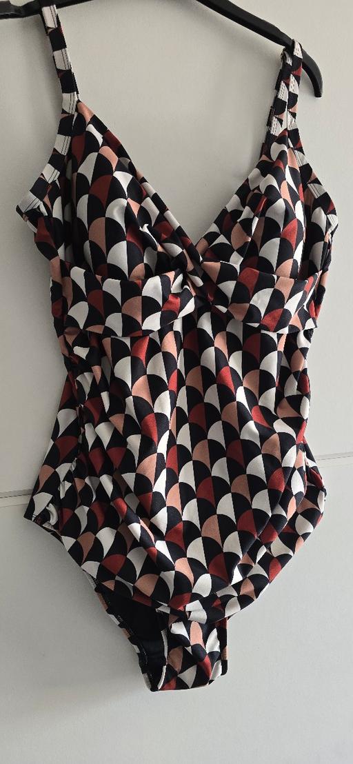  — swimming costume