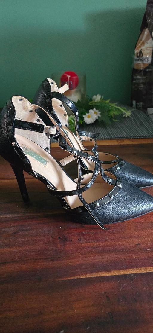  — heels