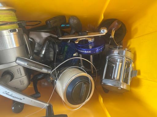  — Fishing tackle container flywheels
