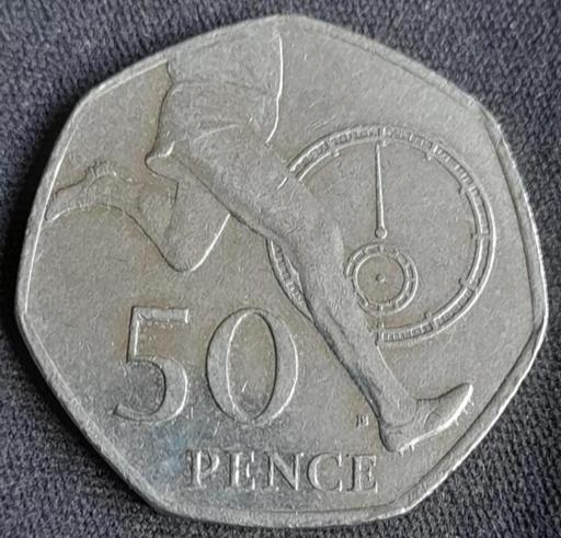 — ROGER BANNISTER
4 MINUTE MILE 50p COIN 2004