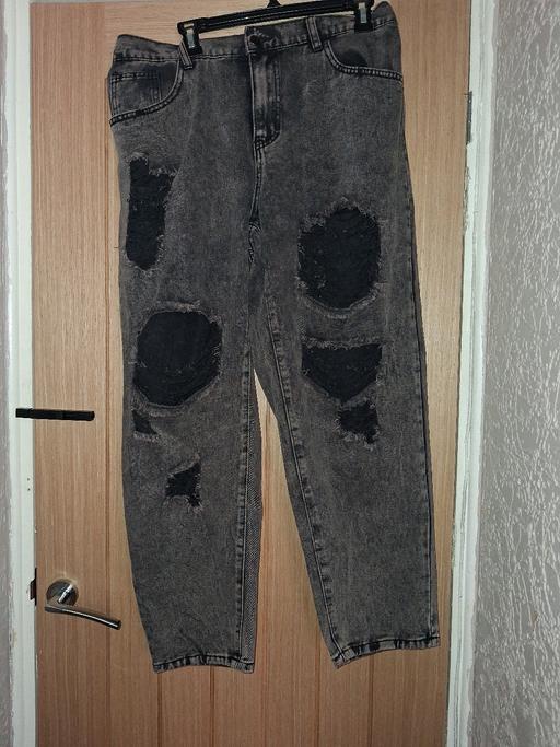  — jeans ripped