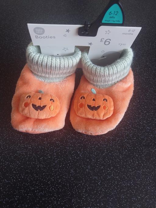  — Babies pumpkin booties size 6-12 months