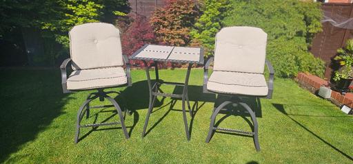  — swivel chairs and table