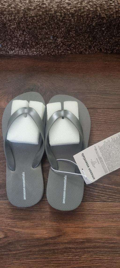  — Grey Flip-flops Size 2
