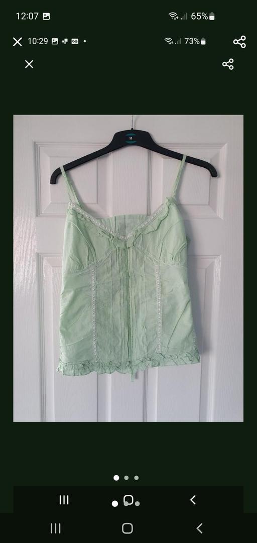  — ladies strappy top
