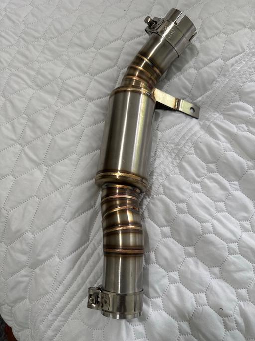  — Motor cycle mid exhaust pipe