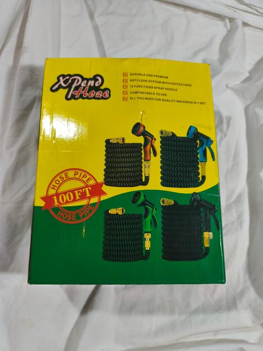  — 100 feet expandable garden hose