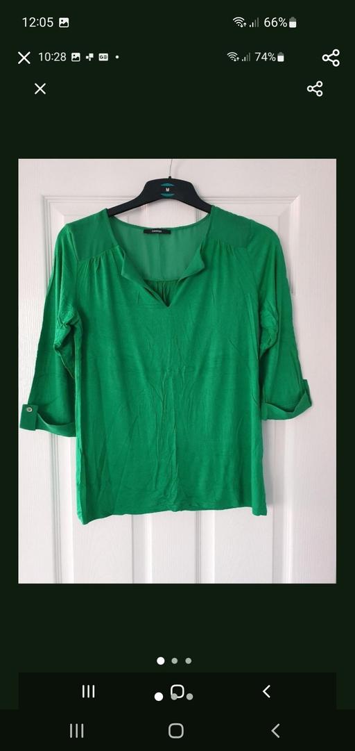  — ladies green top