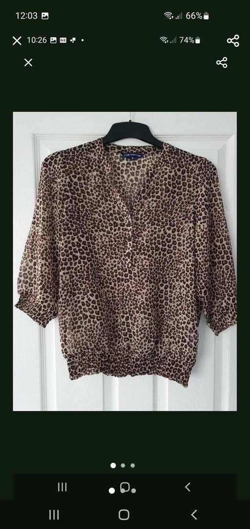  — ladies animal print blouse