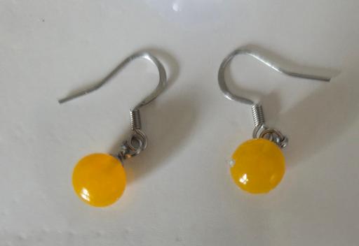  — EARRINGS