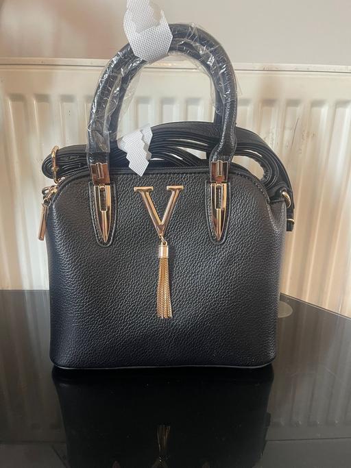  — Handbag