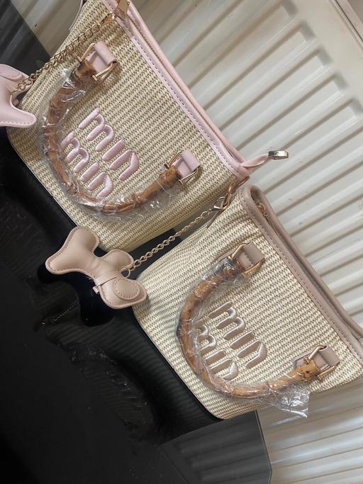  — Handbag