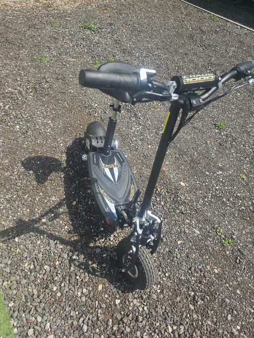  — chaos 1000w scooter, week old