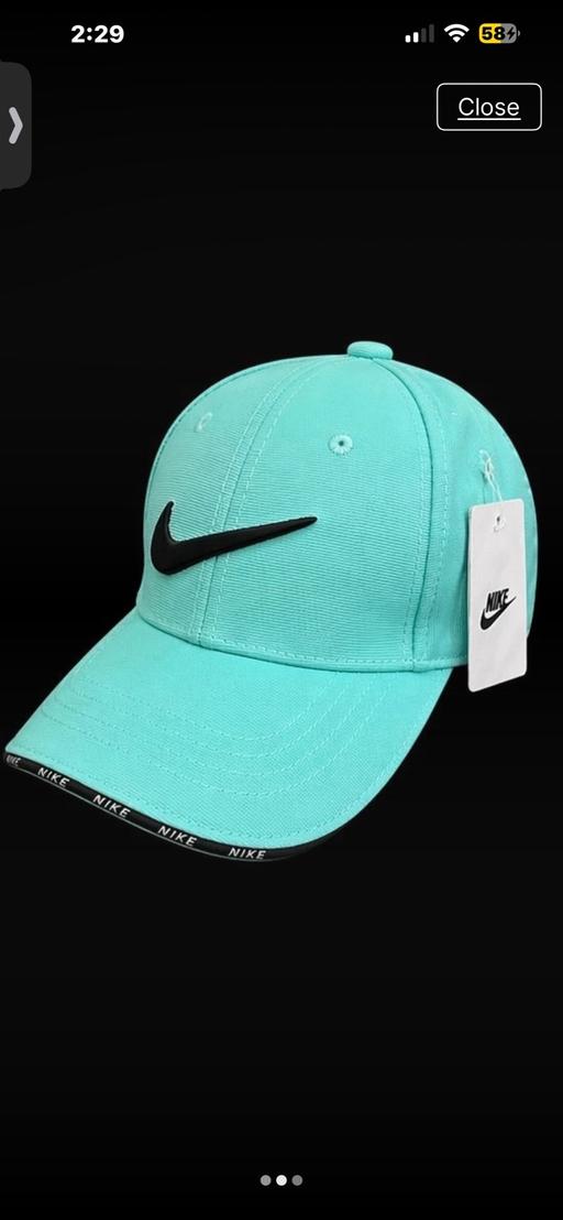  — Blue cap
