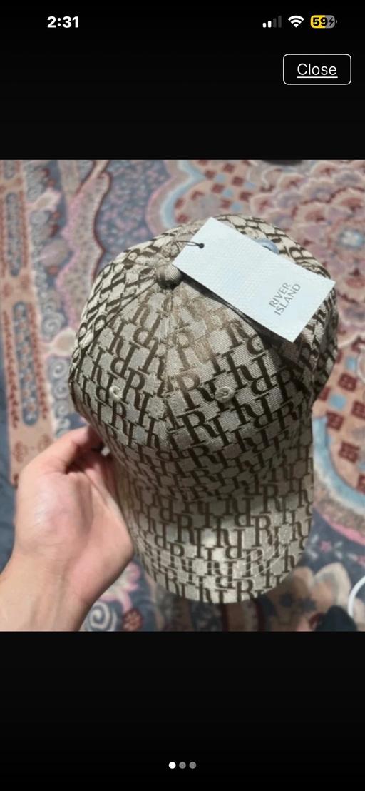  — River island cap