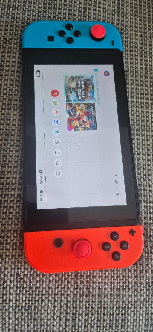  — Nintendo Switch Console with All The Accessor