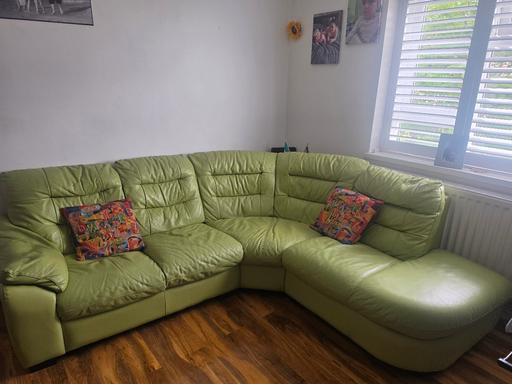  — Green leather sofa